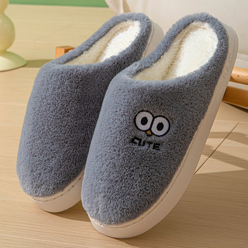 Big-eyed cartoon slippers in thick plush with a rubber sole